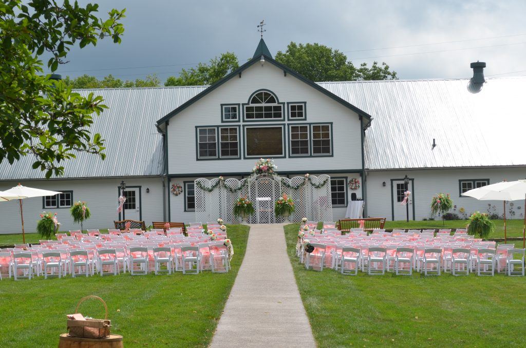 Ceremony in front of the barn